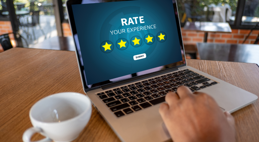 laptop showing customer looking at a 5-star rating