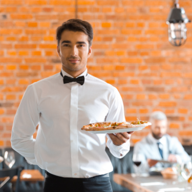 waiter delivering food - reputation management for restaurants 