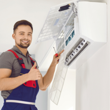 airconditioning contractor repairing an air conditioner - review management for home services