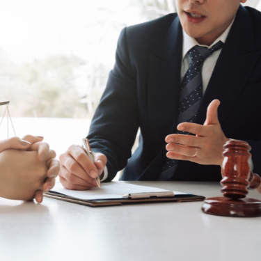 lawyer helping a client   - review management for legal services